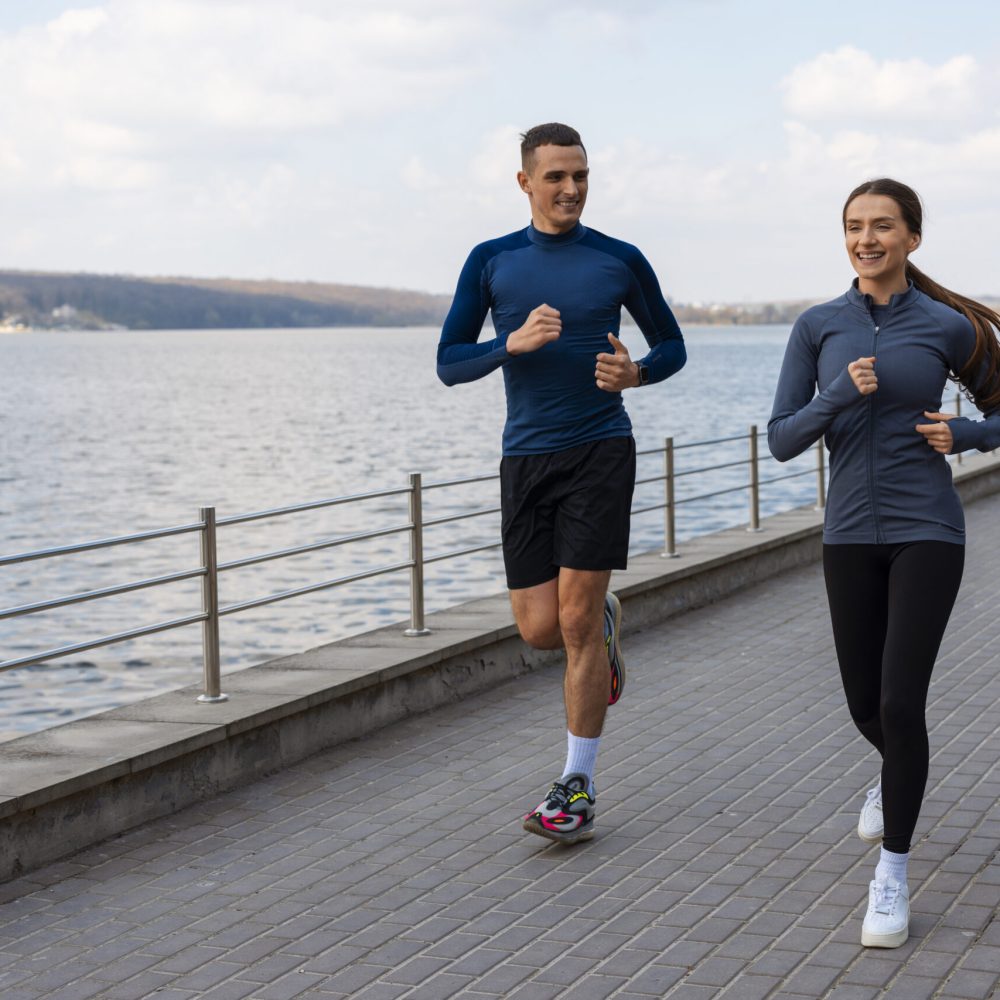 full shot couple doing workout exercises